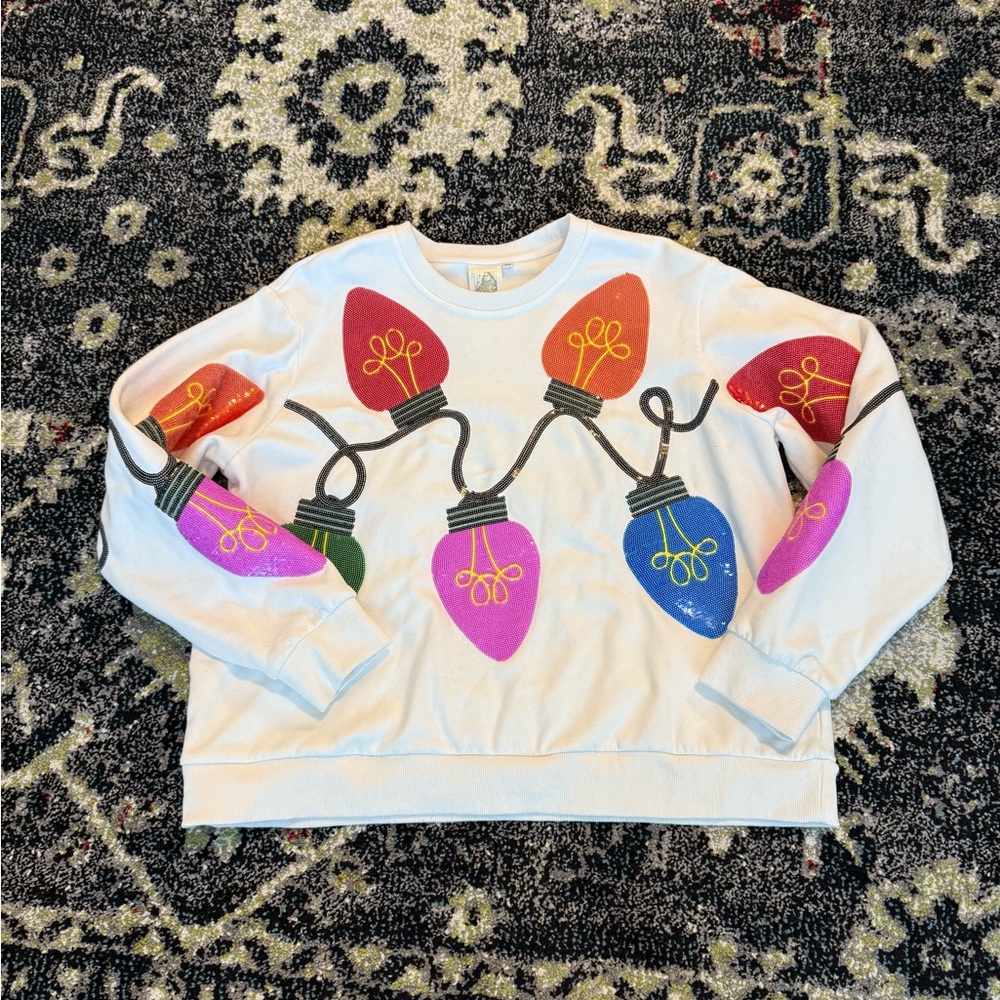 Queen of Sparkles Christmas lights sweatshirt size M.